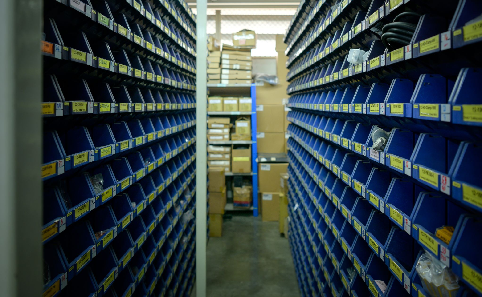 Warehouse aisle bins